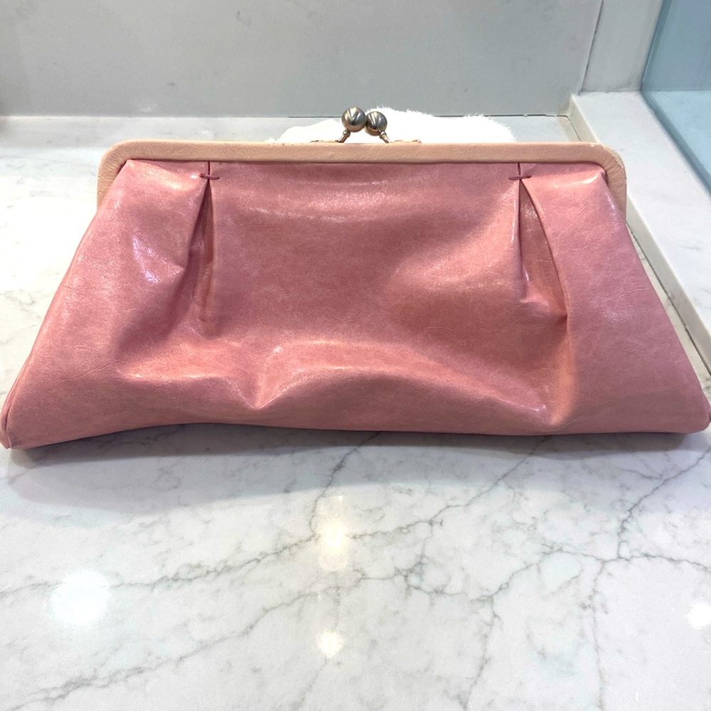 Pink clutch from Arden B in good condition.